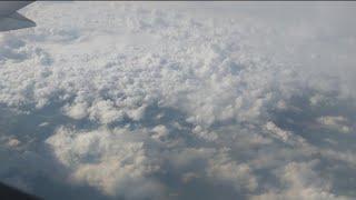 View from above the clouds airplane Take-off and landing full video