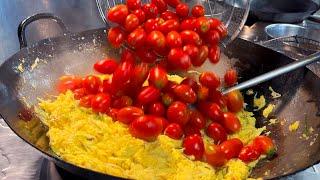 大量のトマトと卵の炒め　 Stir-fried tomato and scrambled eggs