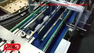 LEAD TECHNOLOGY CUPS YOGURT PACKING LINE IN TRAY WITH ROBOT