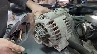 Changing or replacing an alternator in a 2001 GMC or Chevrolet 1500 pickup.