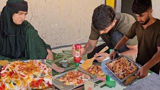 "Journey to the Heart of Village Pizza: Unveiling Culinary Delights،the Melody of a Mother's Effort"