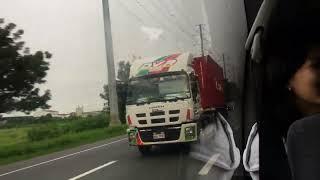 Light White and Light Red Isuzu Giga EXZ 3340 Tractor Head with Red Container in SLEX Laguna