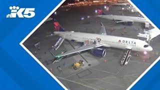 New video shows moments when nose of Delta plane briefly catches fire at SEA Airport