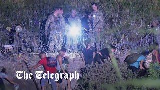 Title 42: Guards smile as they watch desperate migrants struggle to cross