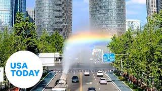 Vibrant rainbow created by anti-pollution mist | USA TODAY