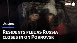 Pokrovsk residents evacuate as Russian forces close in on eastern Ukrainian city | AFP