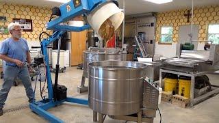 Separating over 400 pounds of honey from wax cappings.