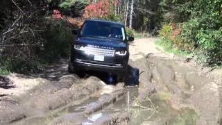 Through a mud pit with the 2014 Range Rover Supercharhed