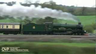 A GWR Castle at speed - 5043 Earl of Mount Edgcumbe racing alongside the M5