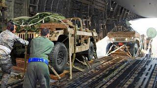 A Day in Life With US Air Force Loadmasters Throwing Humvees at High Altitude