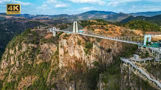 Exploring China's Famous Buddhist Mountain: Do You Dare to Challenge This Suspended Glass Bridge?