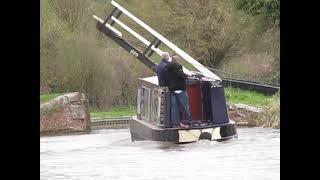 A speeding day hire narrowboat crashes into a lift bridge.