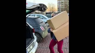 Granny Carries The Boxes