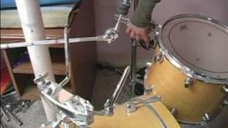 How to Set up a Drum Kit : How to Mount Tom Toms on Bass Drum