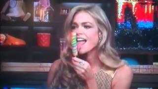 Denise Richards blows lollipop