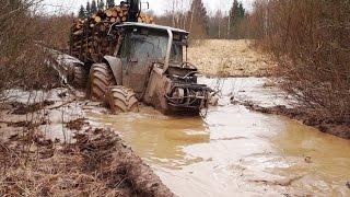 Valtra forestry tractor logging in wet conditions