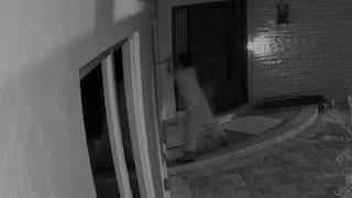 Video: Homeowner watches would-be robber try to smash way into property