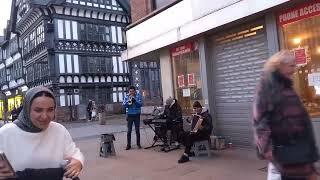 Busking accordian saxophone Chester center  vegan dog Tuesday afternoon 26th Nov 2024 16.00 hours