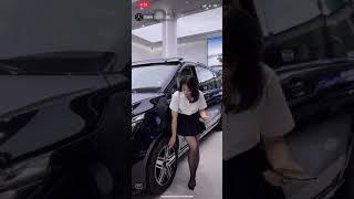 Chinese girl show her black nylon feet