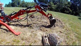 Popped a weld on the Nortrac Towable Backhoe 10" bucket during a "stumpfest".