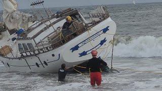 Lifeguards attempt to remove Beached Boat in Playa del Rey