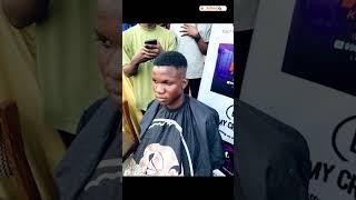 Nigerian Barber Adebayo Owoyemi Makes Guinness World Record For Fastest Skin fade Haircut In 14:56.