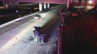 Truck falls onto California freeway