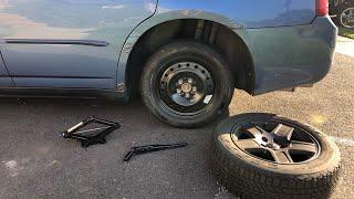 How to change flat tire - wheel removal and donut / spare install - MUST WATCH For Every Car Owner