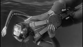 Vintage Scuba Couple diving in a pool. Catch Us If You Can Movie.