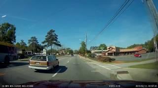 Octogenarian almost takes out 2 cars