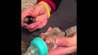 Cleaning a sticky bottle with a lemon essential oil