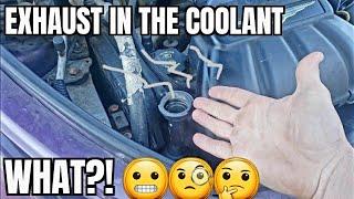 Why is there exhaust coming out of radiator or coolant reservoir pt cruiser blown head gasket