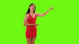 Weather presenter giving newsroom presentation on a green screen.