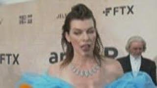 'It's hard to read the news every day' - Ukranian born actor Milla Jovovich speaks at amfAR event in