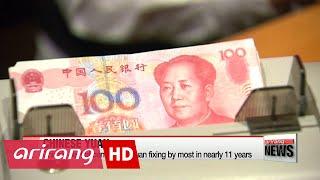 China's central bank raises Yuan fixing by most in nearly 11 years