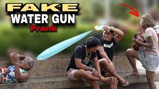 FAKE WATER GUN "PUBLIC PRANK" |  with wonderful voice