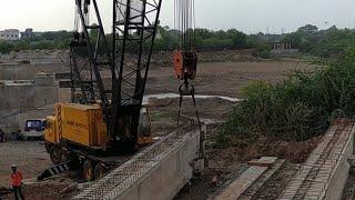 Bridge girder installation on site.