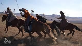 Traditional Mongolian Cavalry performing Horseback Archery .  Namnaa Academy  archers .