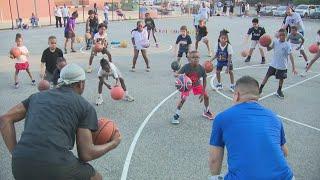 Georgetown basketball great celebrates history in Scotland community with kids clinic