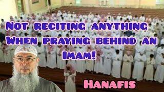 Maulana (hanafi) says it's prohibited to recite behind the imam even in silent rakah Assim al hakeem