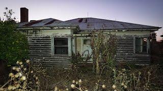 Desolate old eerie home at the end of a long drive way in the middle of no where