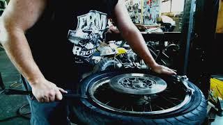 How to mount and balance a motorcycle tire at Skidmark Garage