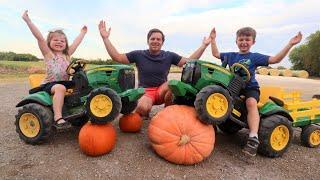 Crushing pumpkins with kids tractors and real tractors | Tractors for kids