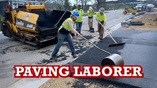 Asphalt Paving Laborers In Action