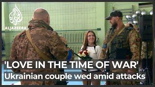 Love in the time of war: Ukrainian couple marry amid battle for Kyiv