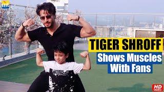 Tiger Shroff meets a small fan and shows muscles with him during Heropanti 2 promotions