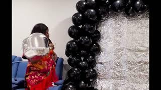 DIY Backdrop using cardboard, foil and balloons