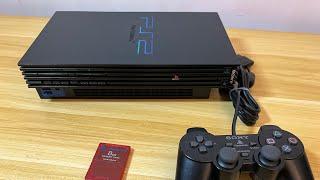 Unboxing a used Playstation 2 in 2024.