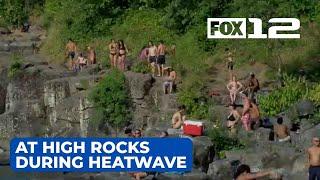 People relax at High Rocks during heatwave