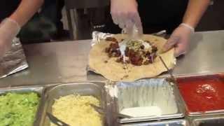 Speedy Chicken and Steak Burrito Made in Chipotle Mexican Grill in Fresno, California